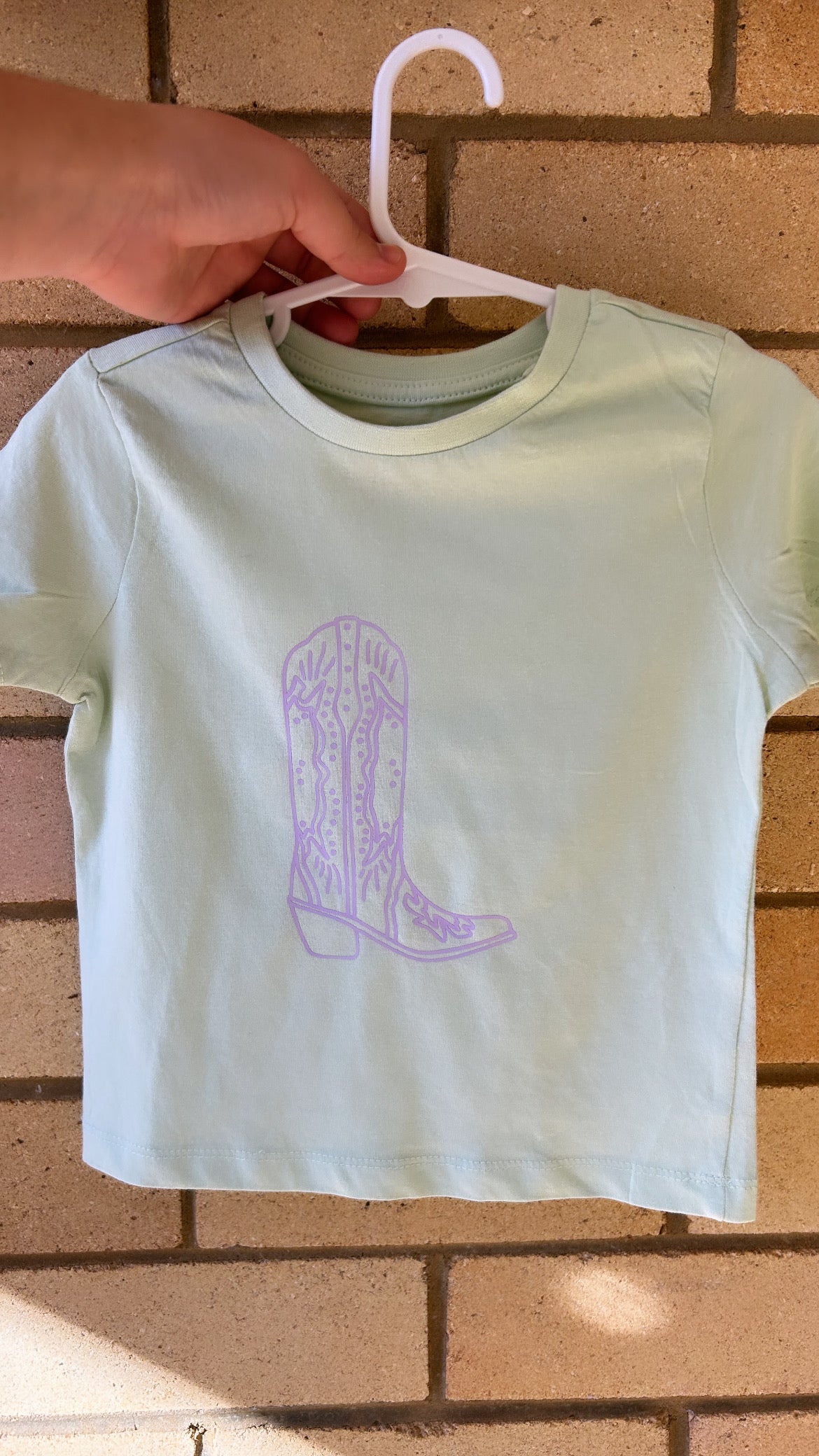 Green T-Shirt with Purple Boot Decal